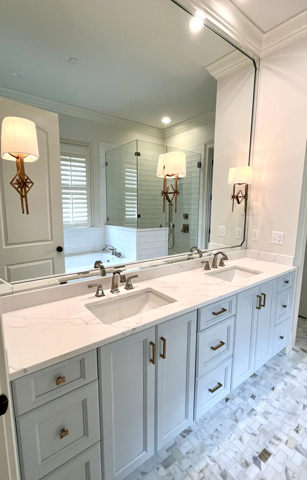 Custom glass vanity and mirror installation in Chattanooga